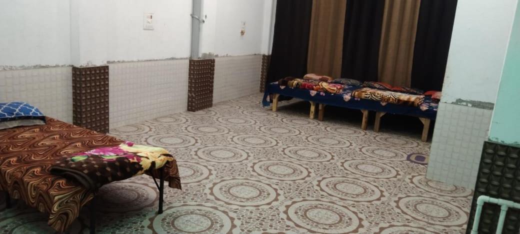ホテル Mangal Dham, デーオーガル 部屋 写真